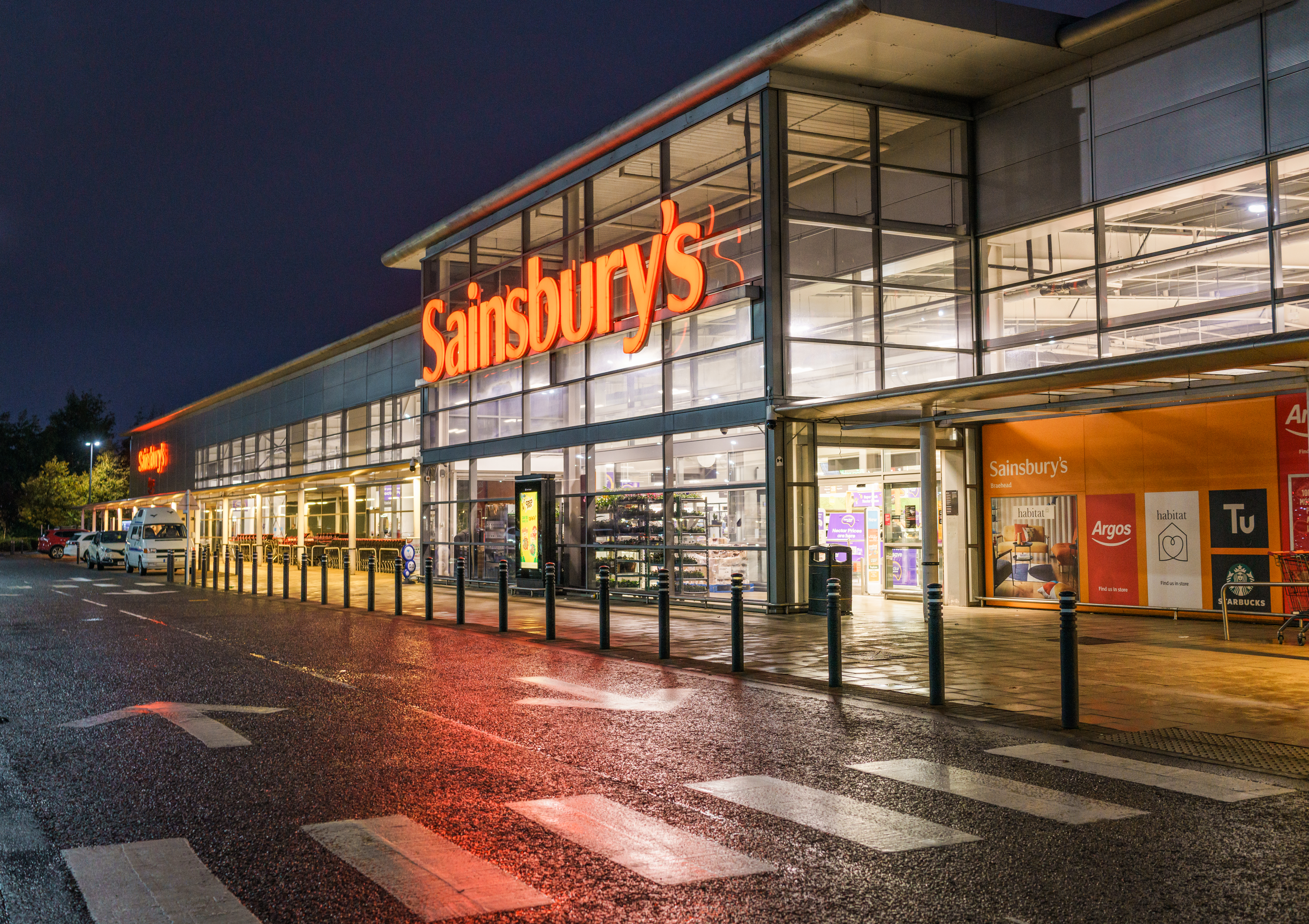 Sainsbury's supermarket at night.