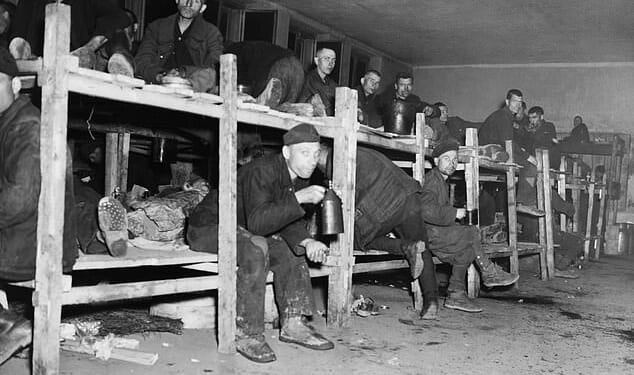 German prosecutors are investigating a 100-year-old man on suspicion he served as a prison guard at a Nazi camp in Hemer, Germany. Pictured: The interior of the 'hospital' room at the Nazi prisoner of war camp near Hemer, Germany