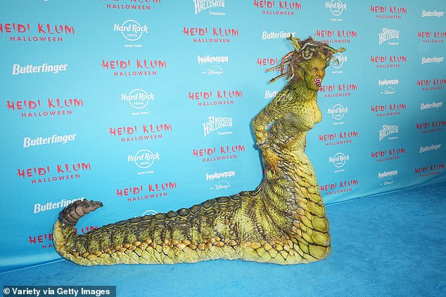 Her costume has all different colors and layers of snakeskin on it, and she even had a piece in her mouth mean to look like the tongue of a rattlesnake