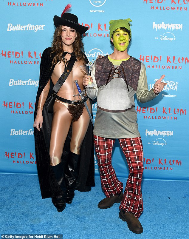 Actor Darren Criss and his wife Mia Swier rocked fun looks, as Swier appeared to dress as Puss in Boots and Criss as Shrek