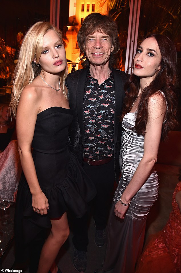 The Rolling Stones star, 82, has eight children with different wives and his eldest and youngest children share a huge 46-year age gap (pictured with daughters Georgia and Elizabeth)