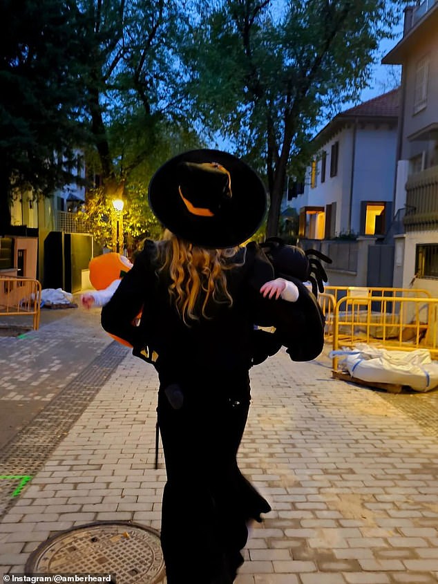 'Halloweening with my minnies,' Heard, 39, captioned an accompanying post on Instagram