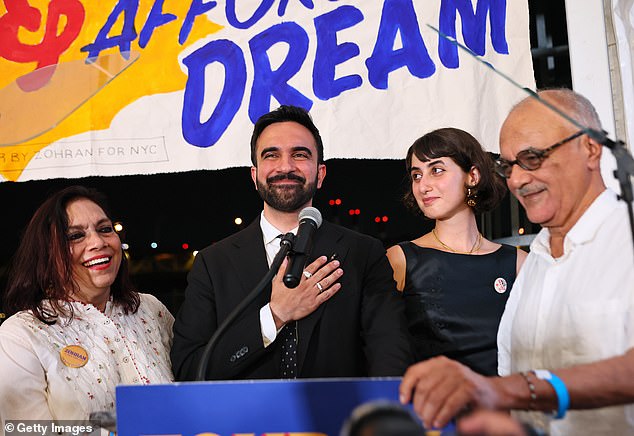 His mother Mira Nair (left) is Oscar-nominated filmmaker Mira Nair while his father Mahmood Mamdani (right) is a prominent Left-wing academic. His wife Rama Duwaji (second right) is a Syrian-born illustrator he met on a dating app and who shares his trenchant views on Palestine. Pictured: The family with Mamdani at an election night gathering in June