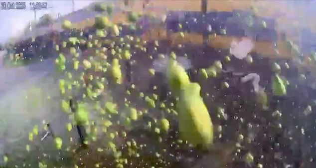 A number of pears rain down and scatter across the line before 400 passengers are safely evacuated