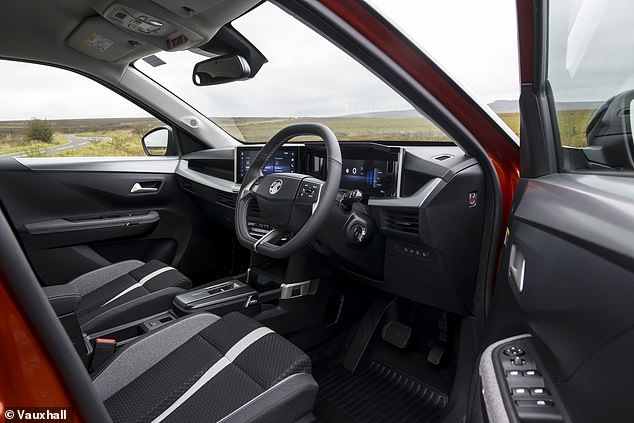 Among the annoying interior features of the Frontera is the silver gloss plastic panel below the side window frame. Rob says you can't perch your elbow on it as it constantly slips off