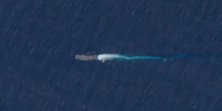 Satellite images reveal US warships with 1,600 Marines edging closer to Venezuela as Trump 'ready to strike at any time'