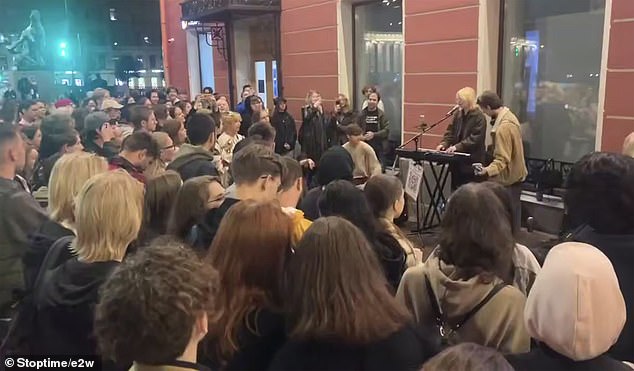 Loginova appears in this screengrab performing the anti-Putin song before her arrest