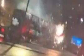 Watch horror moment yobs shoot fireworks at cops & bus full of passengers in city centre