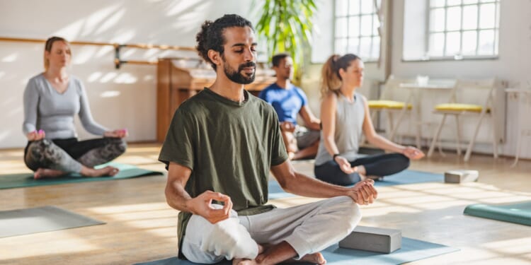 Woke Labour councils blasted for giving asylum seekers free yoga classes as residents' council tax soars