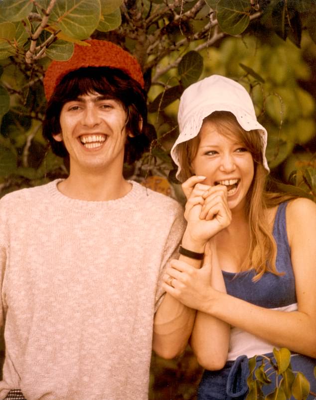 Guitarist George Harrison poses for a portrait with his Pattie Boyd in 1966