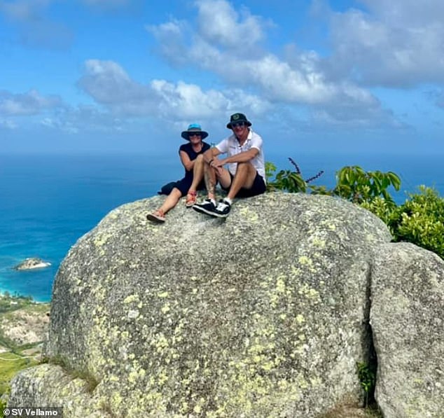 Ayris and her partner Matthew (pictured), who were aboard SV Vellamo anchored near Lizard Island, were listening to emergency radio transmissions sent from the Coral Expeditions vessel