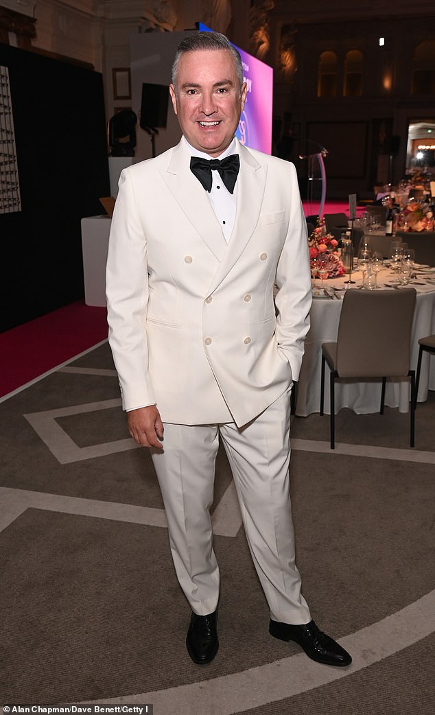 TV presenter Nick Ede opted for a cream suit