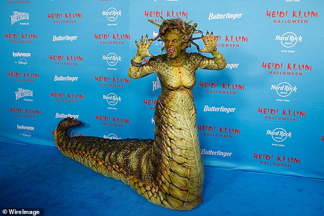 For her 24th annual party in New York, model Heidi Klum dressed as a colossal Medusa, complete with scales, a ginormous tail and moving snakes for hair