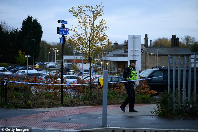 Police had at one point declared Code Plato, a word used by police and emergency services when responding to a 'marauding terror attack'. However, this declaration was later rescinded, BTP confirmed (Pictured: Police patrolling the station on Sunday morning)