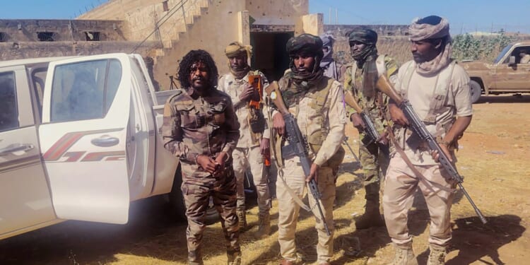 Sudan militia slaughter children in front of parents as thousands trapped in 'apocalyptic' city after horror massacre