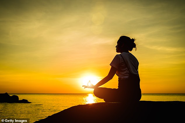 Miranda is a fan of meditating and watching the sun rise (picture posed by model)