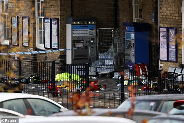 Objects lie scattered on the ground at Huntingdon Station following a series of stabbings on a train