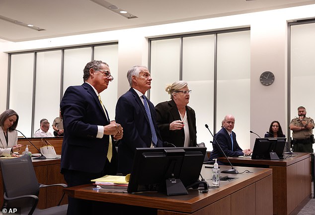 Defense attorneys Richard G Novak, left, Michael N Burt, and Kathryn Nester, who are representing Tyler Robinson