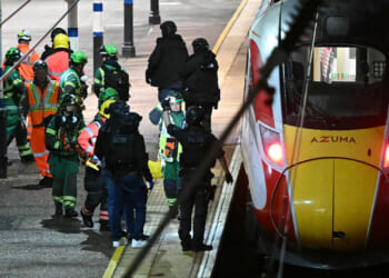 Hero railman fighting for his life after he joined passengers trying to stop train knife attacker during 15-mins of hell