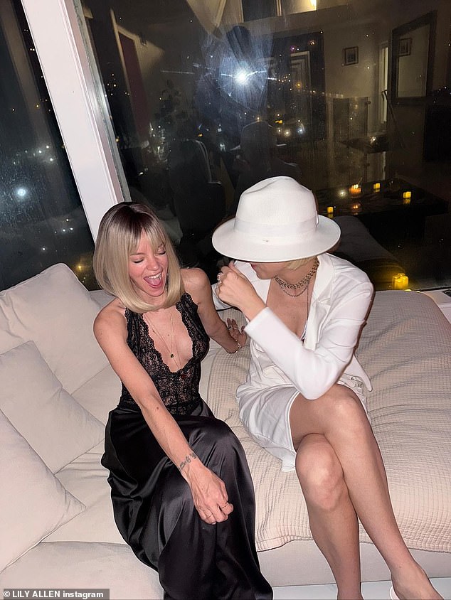 She rocked a cool blonde bobbed wig during the bash as she posed for photos with friends