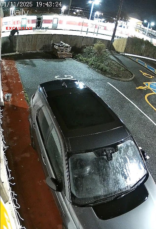 Footage shows a knifeman carrying a blade while walking through a car park next to Huntingdon rail station in Cambridgeshire following Saturday night's train stabbings