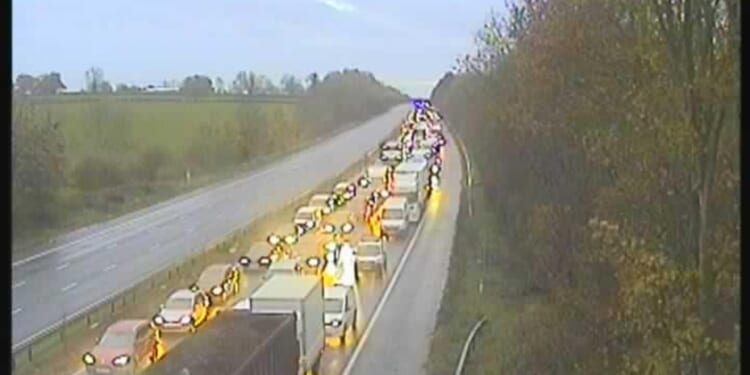 M1 motorway closed in BOTH directions after collision involving two lorries and fire with commuters facing severe delays