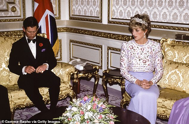 When the pair attended a South Korean State Banquet hosted by then-President Roh Tae-woo, Diana, who donned a Catherine Walker evening gown and the Spencer family's heirloom tiara, struggled to hold a sincere smile
