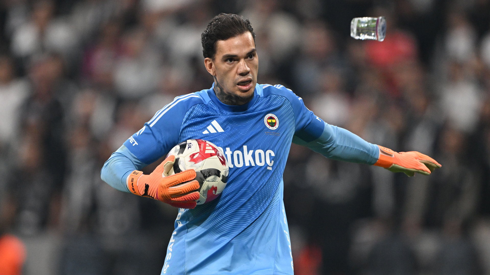 Moment ex-Man City star Ederson is pelted with cups by fuming Besiktas fans before he tries to VOLLEY one back at them