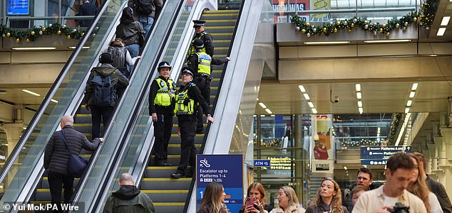 British Transport Police at St Pancras International station, London. Transport Secretary Heidi Alexander said there would be an increased police presence at stations after a number of people were stabbed on a train on Saturday in Cambridgeshire. Picture date: Monday November 3, 2025. PA Photo. Photo credit should read: Yui Mok/PA Wire