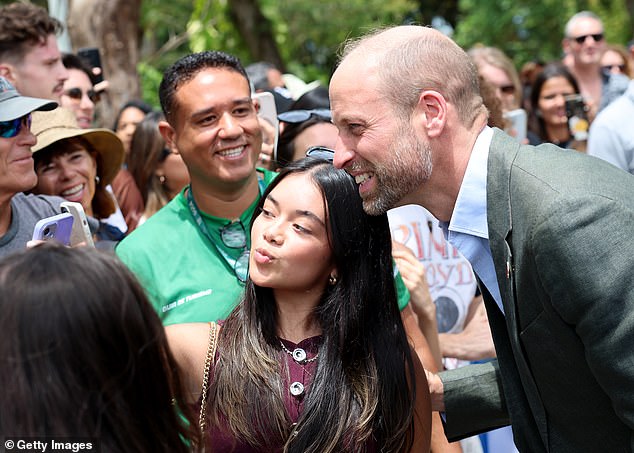 William poses for pictures with royal fans in Rio de Janeiro