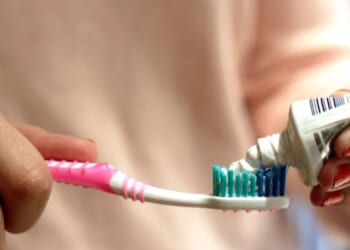 Doing your teeth twice a day 'isn't always best' and why you should NEVER brush after breakfast