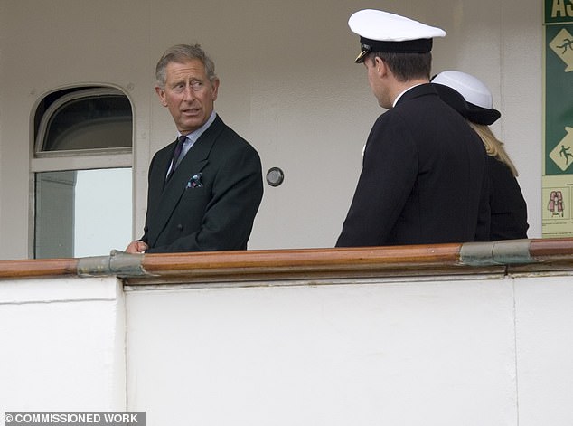 Charles on board the Hebridean Princess as it arrives in Stornaway on the island of Lewis at the end of the cruise