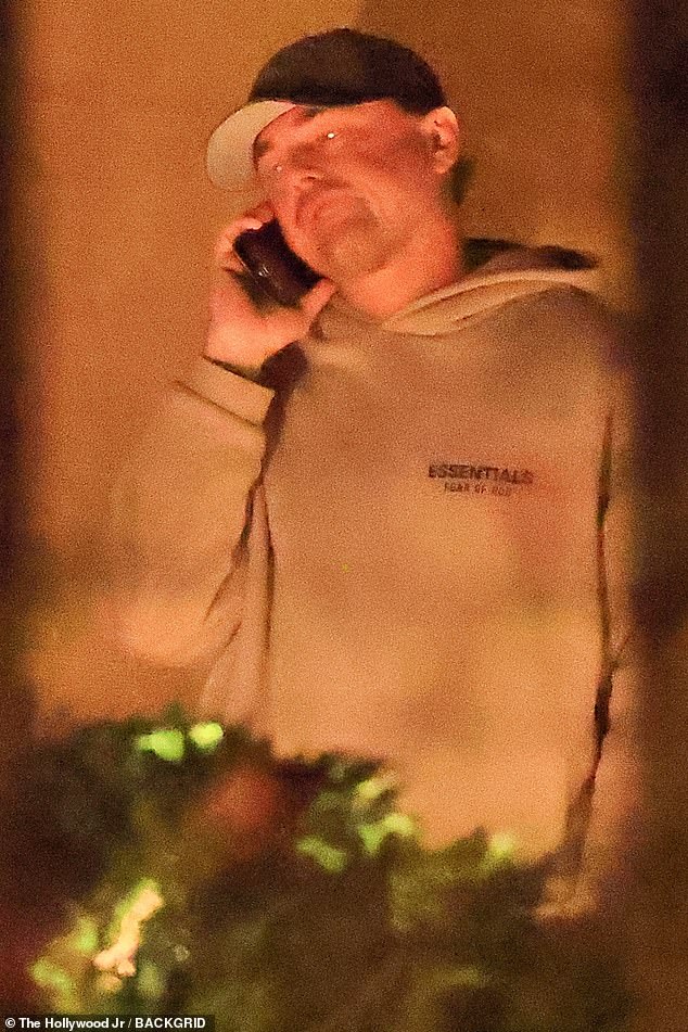 The Oscar winner kept it casual, sporting a beige Essentials hoodie and a Dodgers cap in celebration of Los Angeles clinching their third World Series title in six years