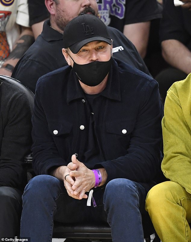 DiCaprio often hides behind hats, masks and sunglasses in public (seen in 2023)