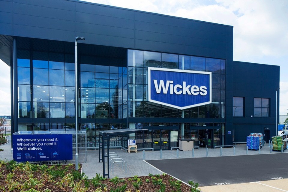 Exterior of a Wickes store with a large blue sign displaying the company logo.