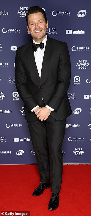 Elsewhere Mark Wright cut a dapper figure in a black tuxedo which he teamed with a crisp white shirt and black bow tie