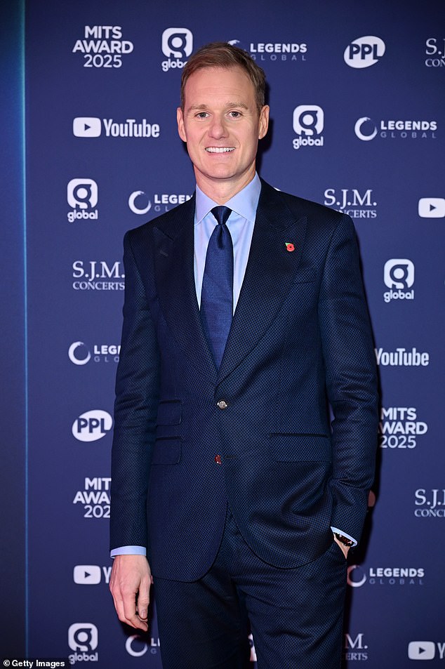 Former Strictly Come Dancing star Dan Walker dressed smart for the night in a navy suit which he paired with a blue shirt and matching tie