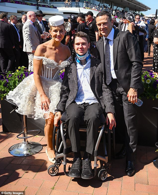 MELBOURNE, AUSTRALIA - NOVEMBER 01: Tom Prebble poses with Brett Prebble and Michelle Payne during 2025 Derby Day at Flemington Racecourse on November 01, 2025 in Melbourne, Australia. (Photo by Vince Caligiuri/Getty Images)