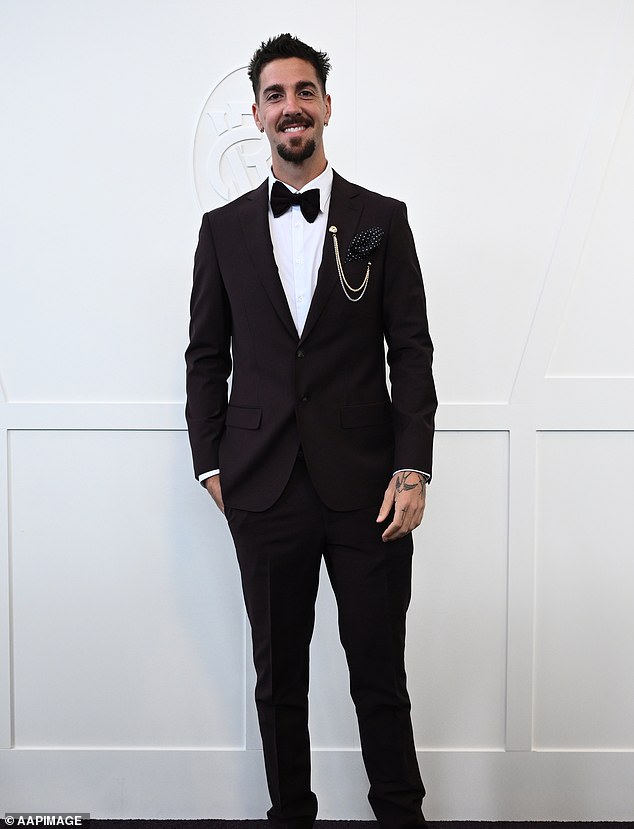 Thanasi Kokkinakis poses for photographs at Flemington Racecourse ahead of the 2025 Melbourne Cup at Flemington in Melbourne, Tuesday, November 4, 2025. (AAP Image/Joel Carrett) NO ARCHIVING, EDITORIAL USE ONLY