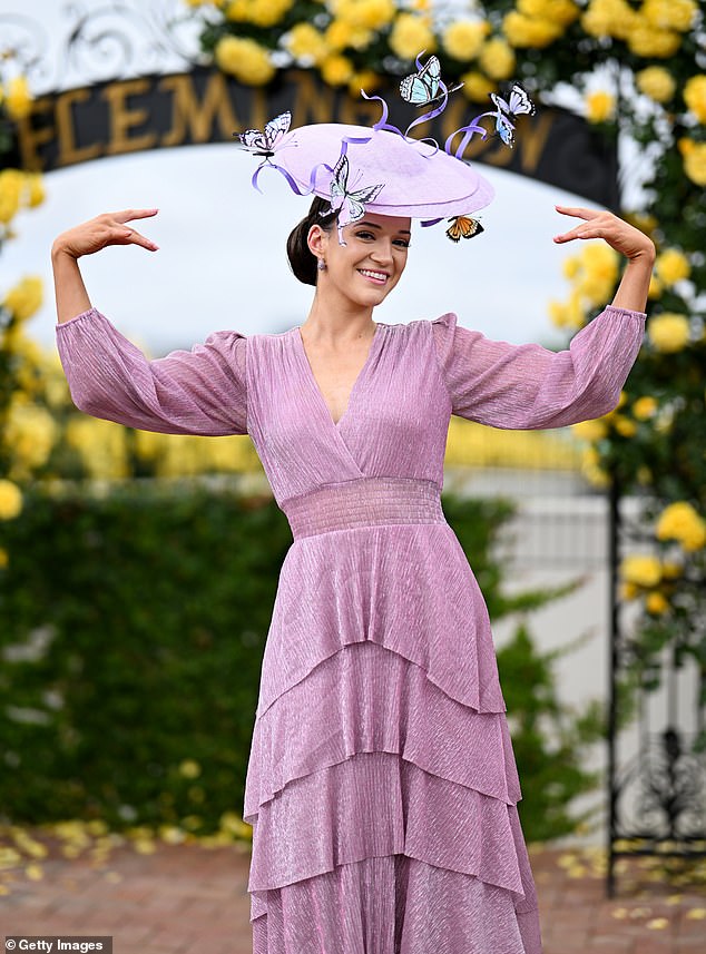 MELBOURNE, AUSTRALIA - NOVEMBER 04: Model Emma Dowling wears millinery by Anita Marshall who is competing in the finals for Lillian Frank MBE Award attends Fashions on the Field during 2025 Melbourne Cup Day at Flemington Racecourse on November 04, 2025 in Melbourne, Australia. (Photo by Wendell Teodoro/Getty Images)