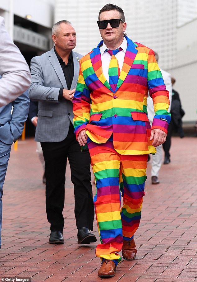MELBOURNE, AUSTRALIA - NOVEMBER 04: Racegoers arrive during Melbourne Cup Day at Flemington Racecourse on November 04, 2025 in Melbourne, Australia. (Photo by Daniel Pockett/Getty Images)