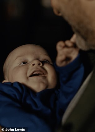 The ad soon cuts from the dad dancing in the club, filmed in Electric Brixton , in London, to flashbacks showing him remembering his son as a toddler and a baby in the '90s (pictured)
