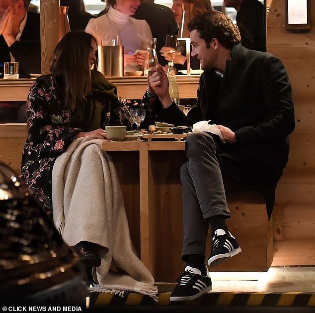 The pair only had eyes for each other and held hands during their swanky dinner