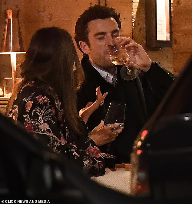 They shared cocktails and wrapped up in blankets while enjoying their swanky meal