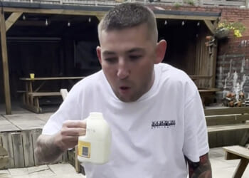 Watch darts star Nathan Aspinall retch and vomit after being forced to do disgusting fantasy football forfeit