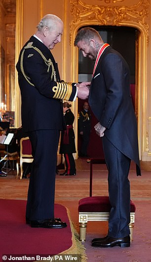Sir David wore a suit tailor made for the occasion by his fashion designer wife while meeting the King