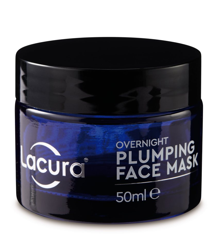 A dark blue jar with a black lid labeled "Lacura Overnight Plumping Face Mask 50ml e."