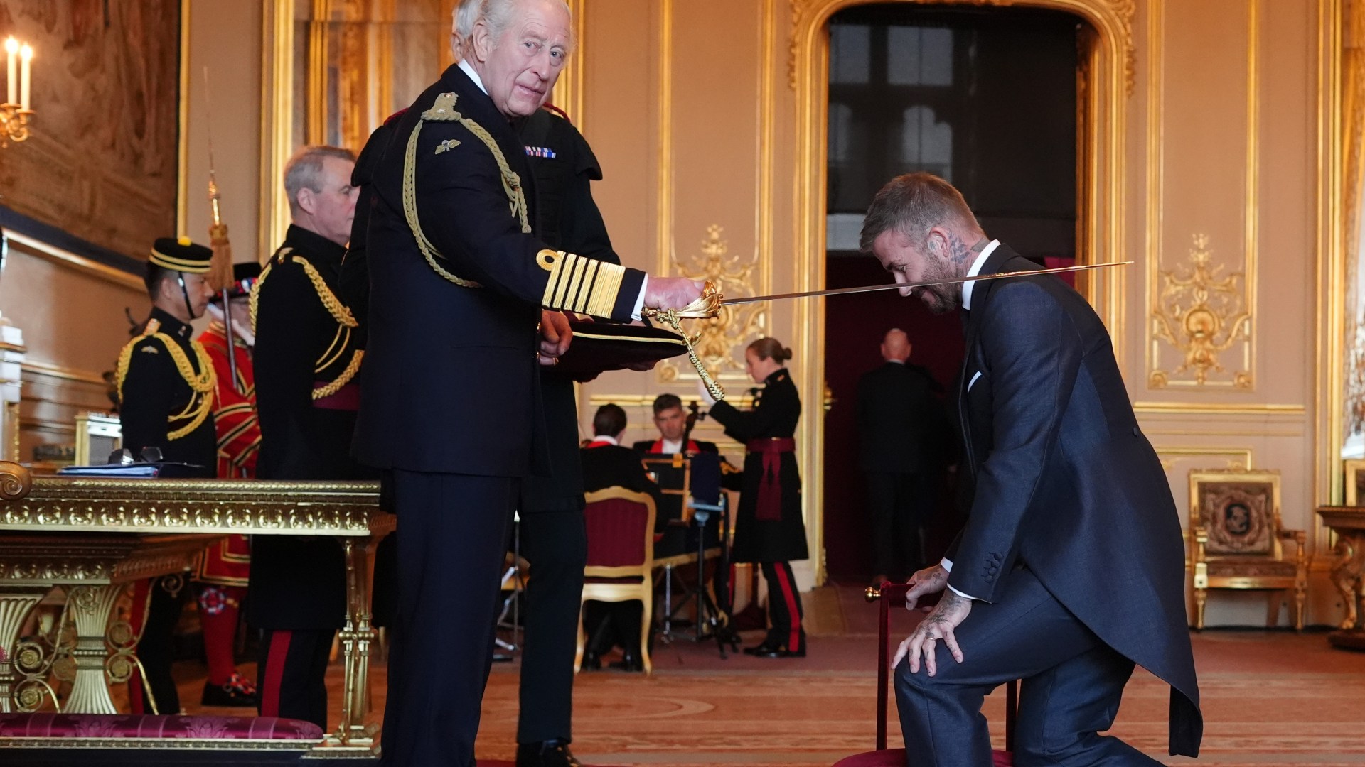 Tearful David Beckham opens up to The Sun on 'surreal' honour of being knighted by King after humble upbringing