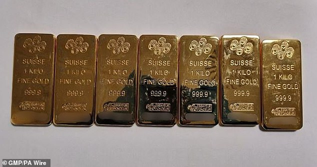The seven gold bars found in a vehicle at the airport by police, estimated to be worth £700,000