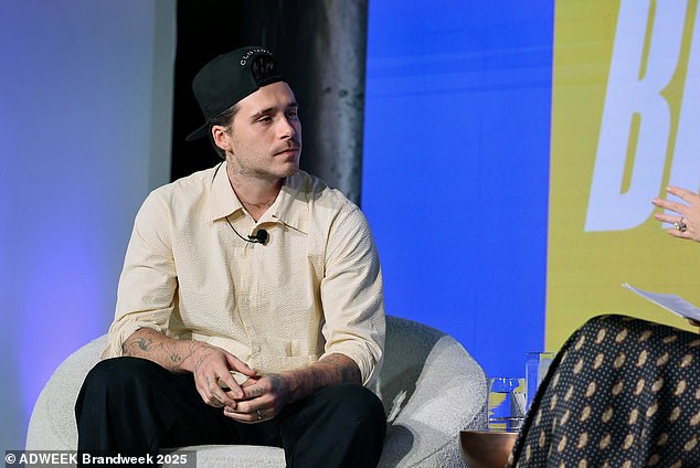 Brooklyn was busy promoting his hot sauce brand at the same time David received his knighthood